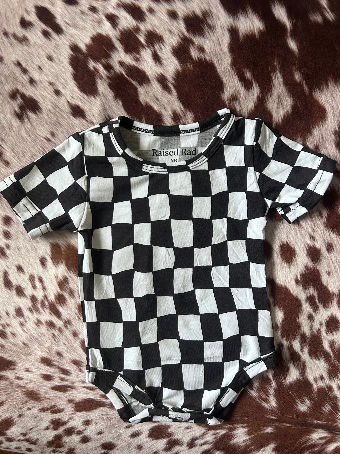 Rad checkered onesie