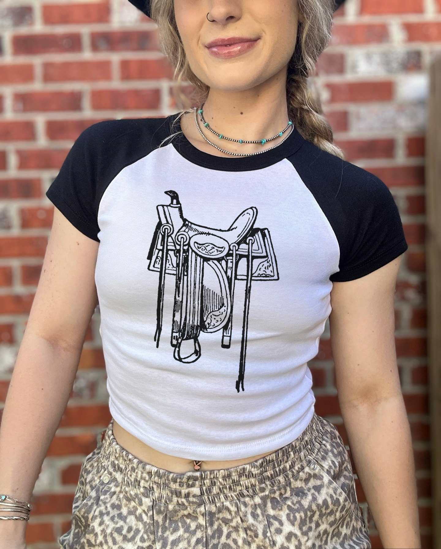 The Saddle Baby Tee
